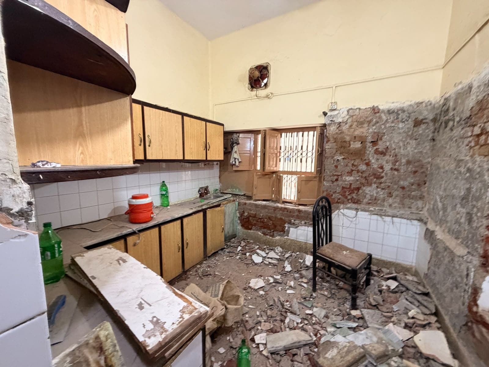 The same kitchen from another angle during the strip-out