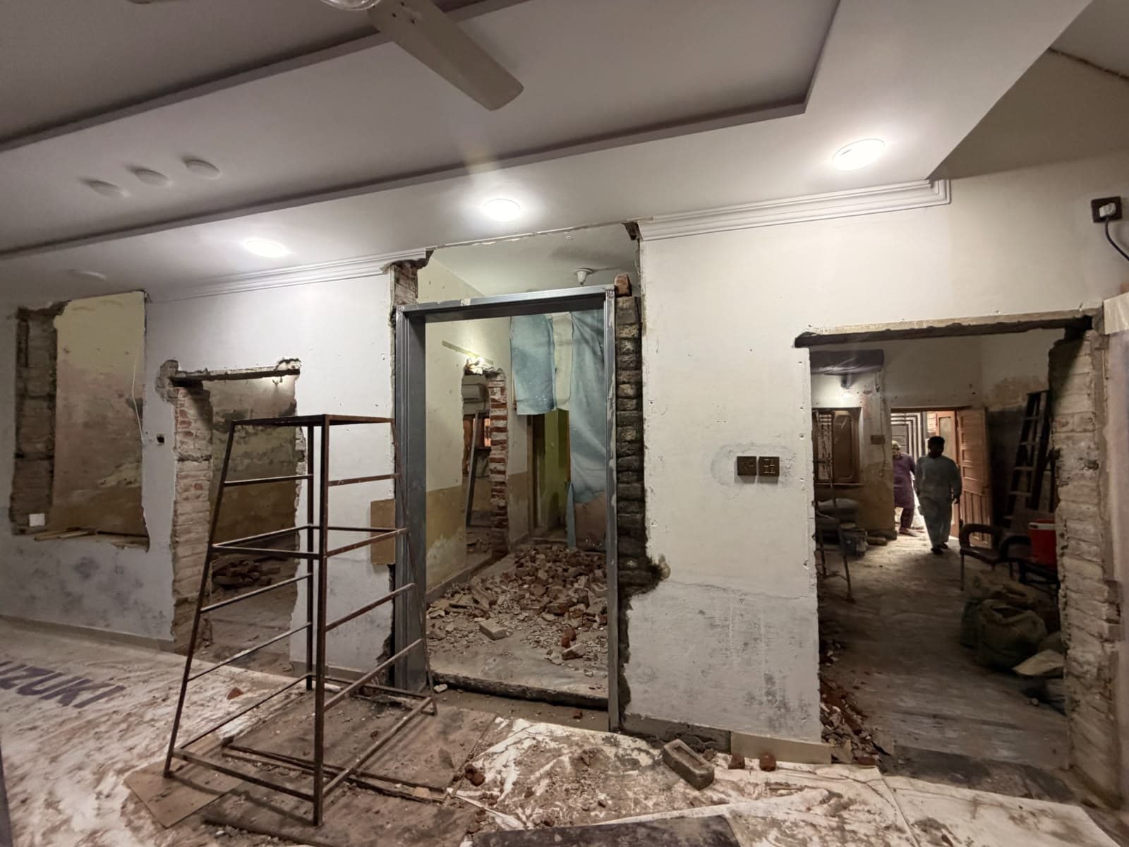 Looking through the cut openings into the rooms beyond